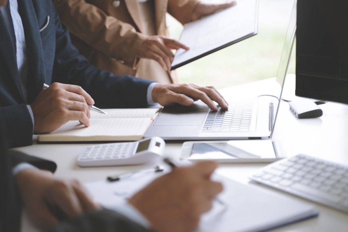 Financial analyst calculating with number documents, Investment concept.