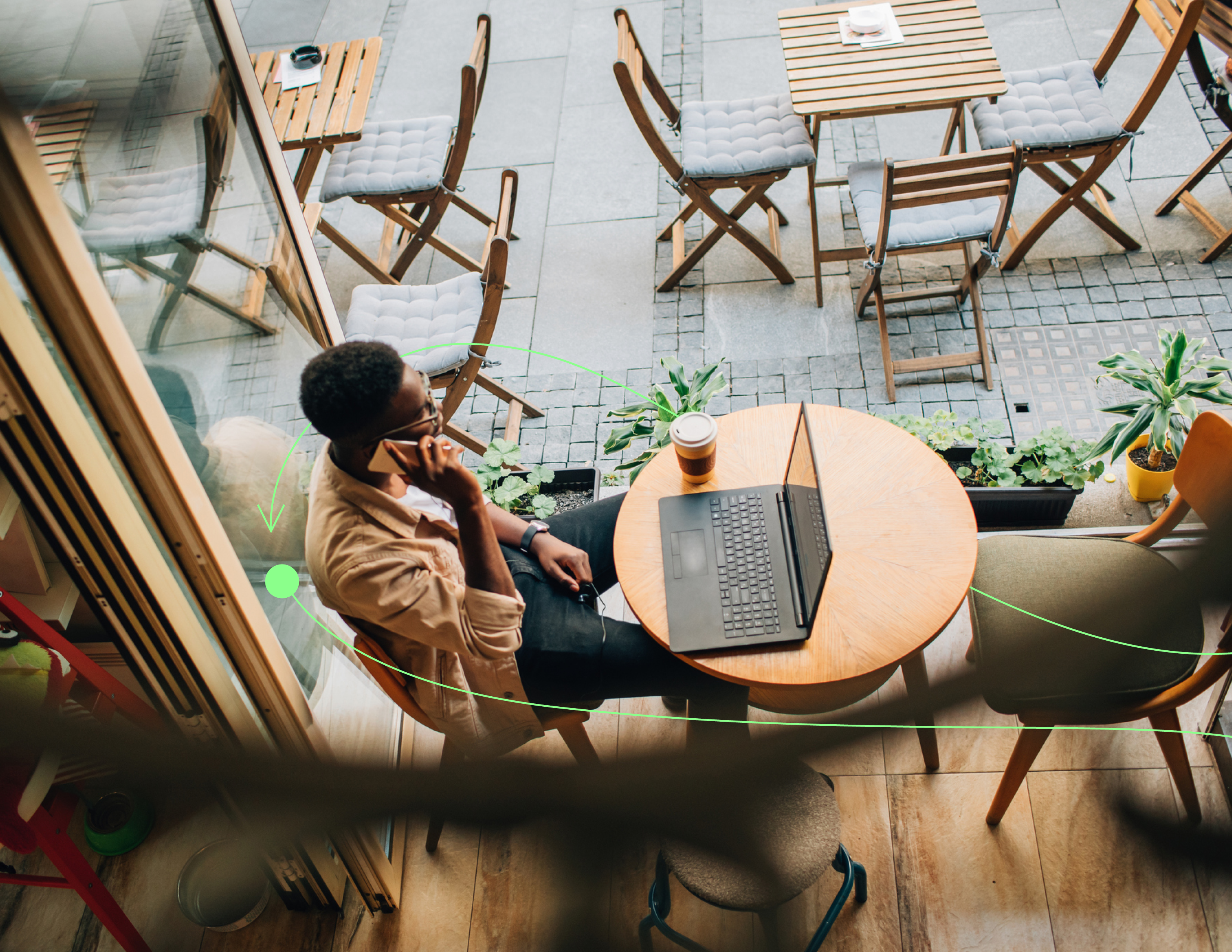 Man sitting at table on laptop